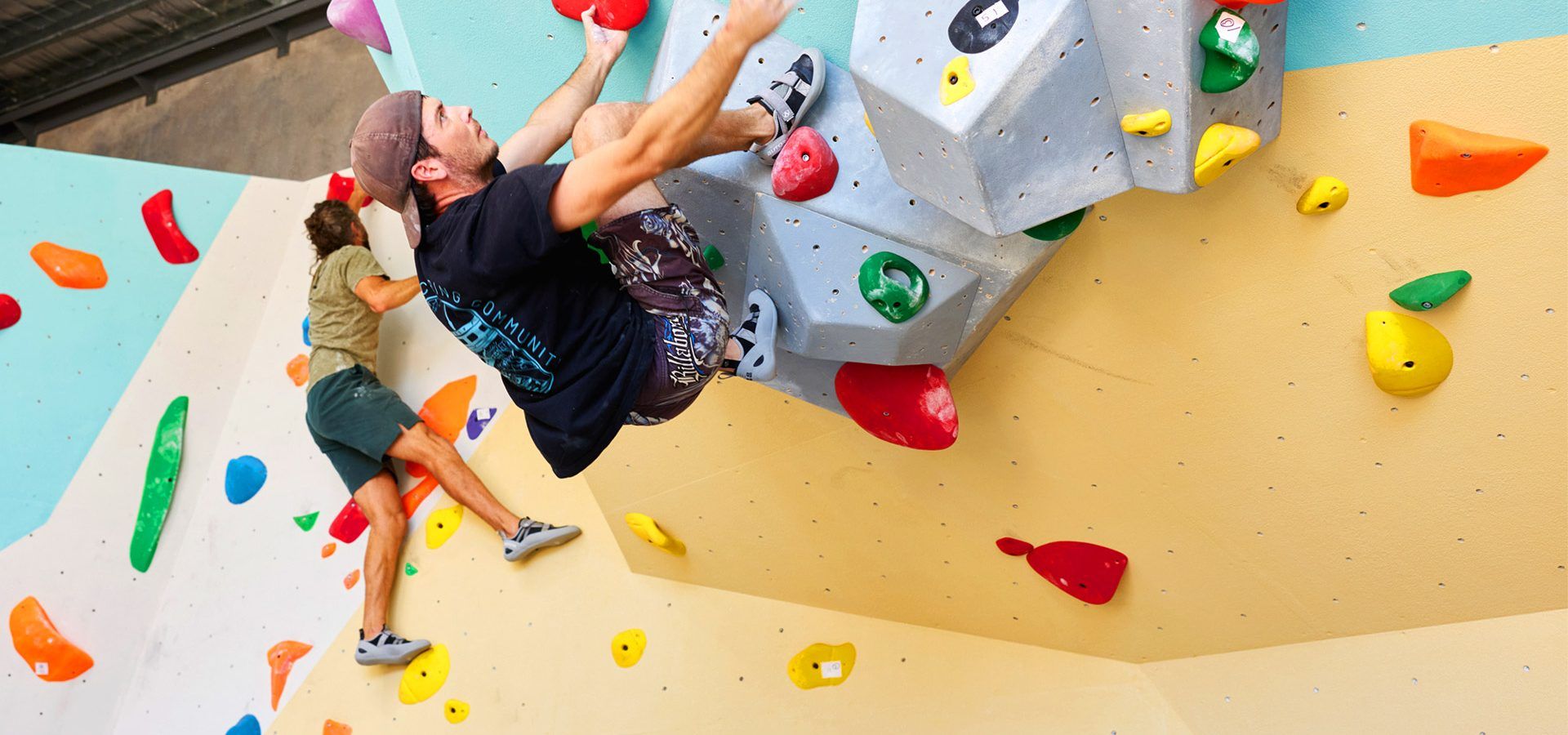 Climber traversing an overhang at Ascend Bouldering in Coffs Harbour